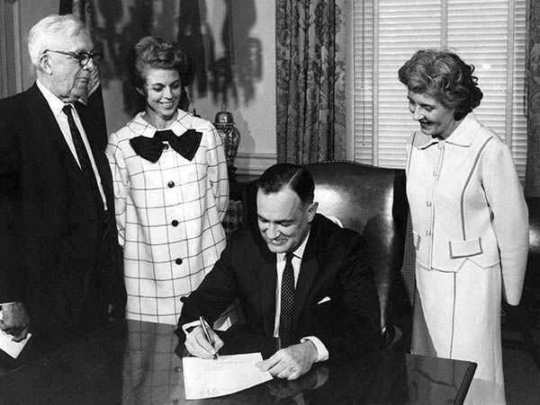 Gov. Mills Godwin signs the bill that consolidated Richmond Professional Institute and the Medical College of Virginia into one entity, creating Virginia Commonwealth University in 1968.